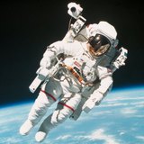An astronaut with the Earth in the background