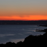 Галт уулын дэлбэрэлтийн дараа жаргаж буй нар